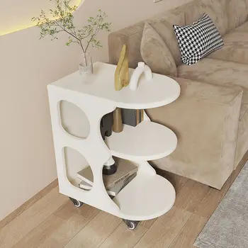 маленький журнальный столик, небольшое домашнее хозяйство в кремовом стиле, диван-буфет, бытовой угловой столик, угловой столик с небольшой тележкой в гостиной